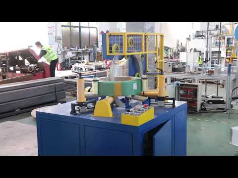 Horizontal coil wrapping machine