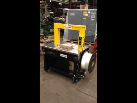Interlake strapping machine