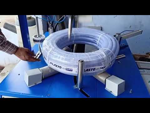 Braided hose pipe coil wrapping machine