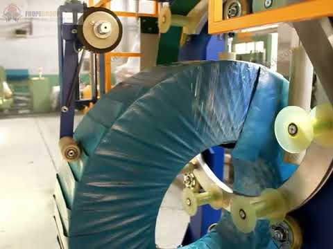 coil wrapping machine with tapping