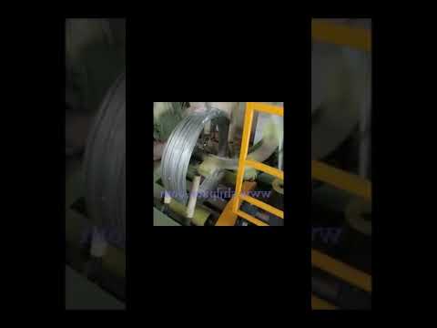 Wire coil wrapping machine