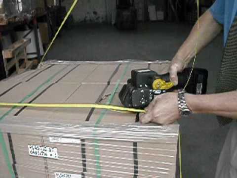 Pallet strapping machine places two straps around a pallet in just 6 seconds!
