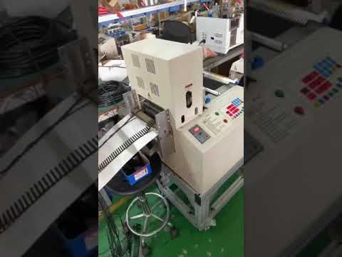 Automatic velcro tape strap cutting machine