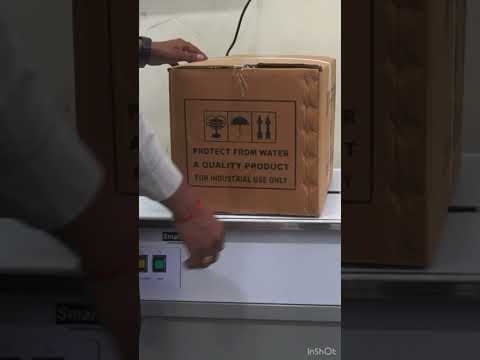 BOX STRAPPING MACHINE