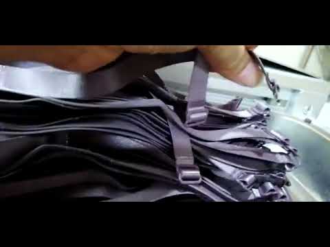 Automatic bra strap buckle inserting sewing machine