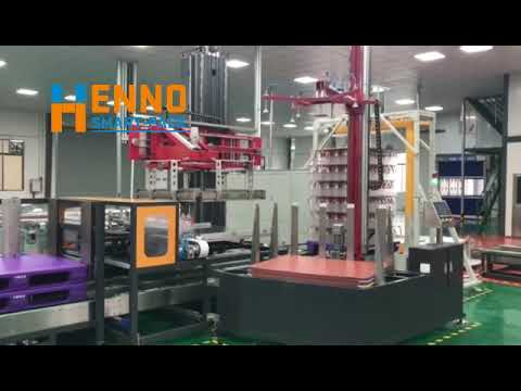 HENNOPACK EMPTY BOTTLE PALLETIZING SYSTEM WITH SLIP SHEET DISPENSER AND STRAPPING MACHINE