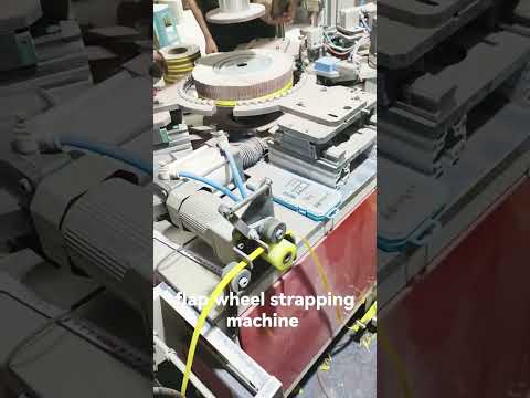 Flap wheel strapping machine