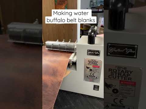 Cutting up water buffalo leather into belt blanks on a Craftool strap cutter