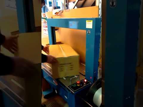 TRS 600 Pacmasta Auto Strapping Machine in Operation
