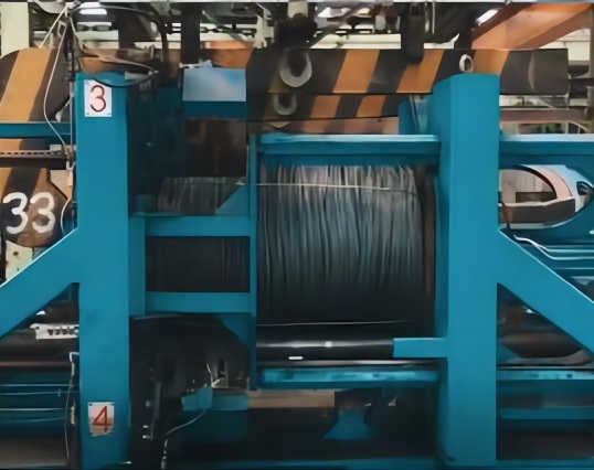 Automatic steel wire coil strapping machine