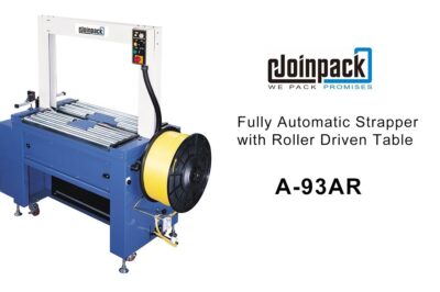 Automatic strapping machine for packaging purposes.