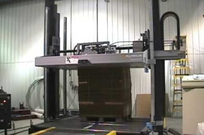 Automated strapping machine with power capabilities