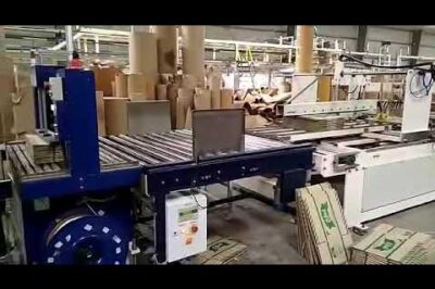 Strapping Machine with Squaring for Corrugated Bundles