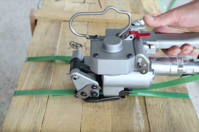 Machine that uses air pressure to secure straps.