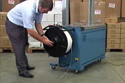 Automatic Strapping Machine with Model Number 602CE.