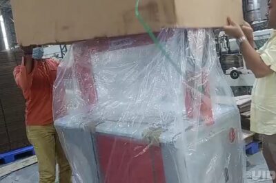 Installation of a new strapping machine for corrugated materials.