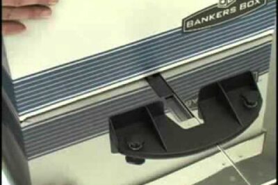 Strapping machine for packaging and bundling.