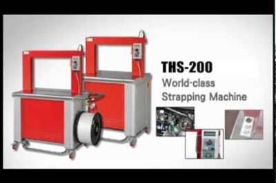 High-speed strapping machine for packaging.