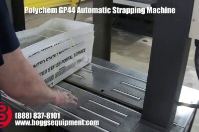 Automatic strapping machine for packaging purposes.