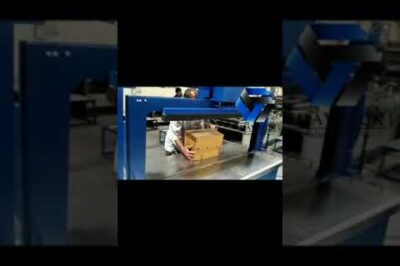 Fully automatic strapping machine with high speed capabilities.