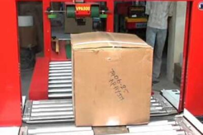 Automatic Taping and Strapping Machine for Efficient Packaging
