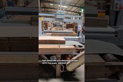 Fast and automated strapping machine with top press mechanism.
