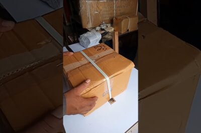 Machine for securing packages with straps.