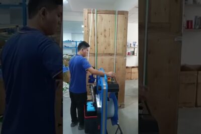 Battery Pallet Strapping Device: Wraps with PET or PP, under 28 words, excluding symbols, brands, and company names.