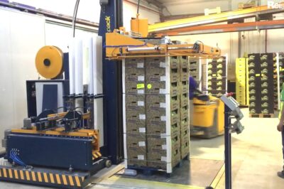 High-speed pallet strapping machine with horizontal automatic functionality.