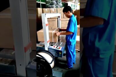 Fully automated machine for carton strapping using electricity instead of manual labor.