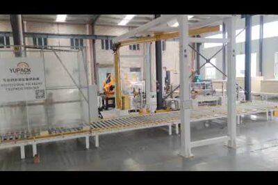 Vertical Pallet Strapping and Rotary Wrapping Machine for fully automatic operation.