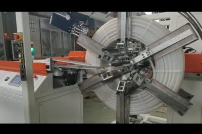 Plastic pipe coiler and strapping machine that operates automatically.