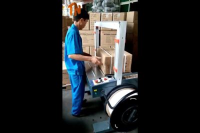 Fully automated machine for strapping cartons.