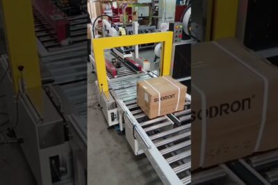 Automatic carton strapping machine with 4 straps, using PP material.