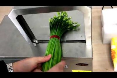 Compact vegetable strapping machine for easy banding on-the-go.