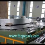 compact coil upender and packing machine for efficient coil handling.