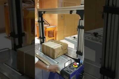 Box strapping machine with automatic functionality for carton boxes.