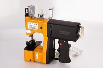 Compact Electric Packing Machine for Sewing, Strapping, and Sealing of Woven Materials.