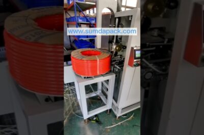 Tube coil strapping machine – automated solution for efficient and reliable strapping without exceeding 28 words and excluding symbols, brand, and company names.