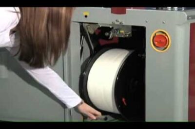 “Compact Strapping Machine for Secure Packaging”