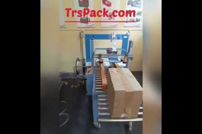 Combo strapping and taping machine for a fully automated solution. Visit www.trspack.com for inquiries. (22 words)