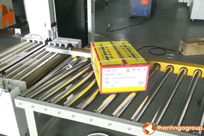 Automatic carton sealing and strapping in combination reduce words to under 28