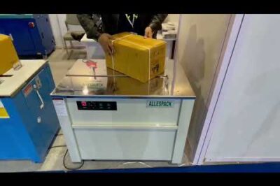 “Compact Strapping Machine JN-740: Semi-Automatic Solution for Efficient Packaging”