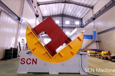 30-ton machine that reverses mold and rotates coils mechanically.