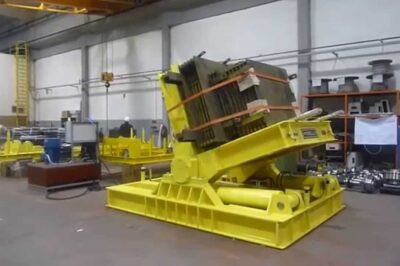 40-ton hydraulic upender/tilter rotates 90°-180°; capacity reduced to 12 words.