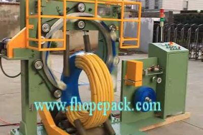 Coil packing machine for hoses in less than 12 words.