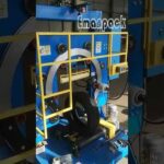 coil wrapping machine efficiently packs tires for automated packaging solutions.