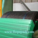 Coil wrapping machine for wire rods.