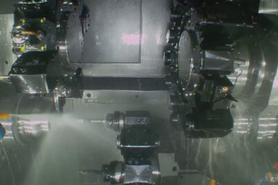 Compact CNC lathe for efficient production turning operations.