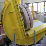 "compact coil handling devices: tilter & upnder"